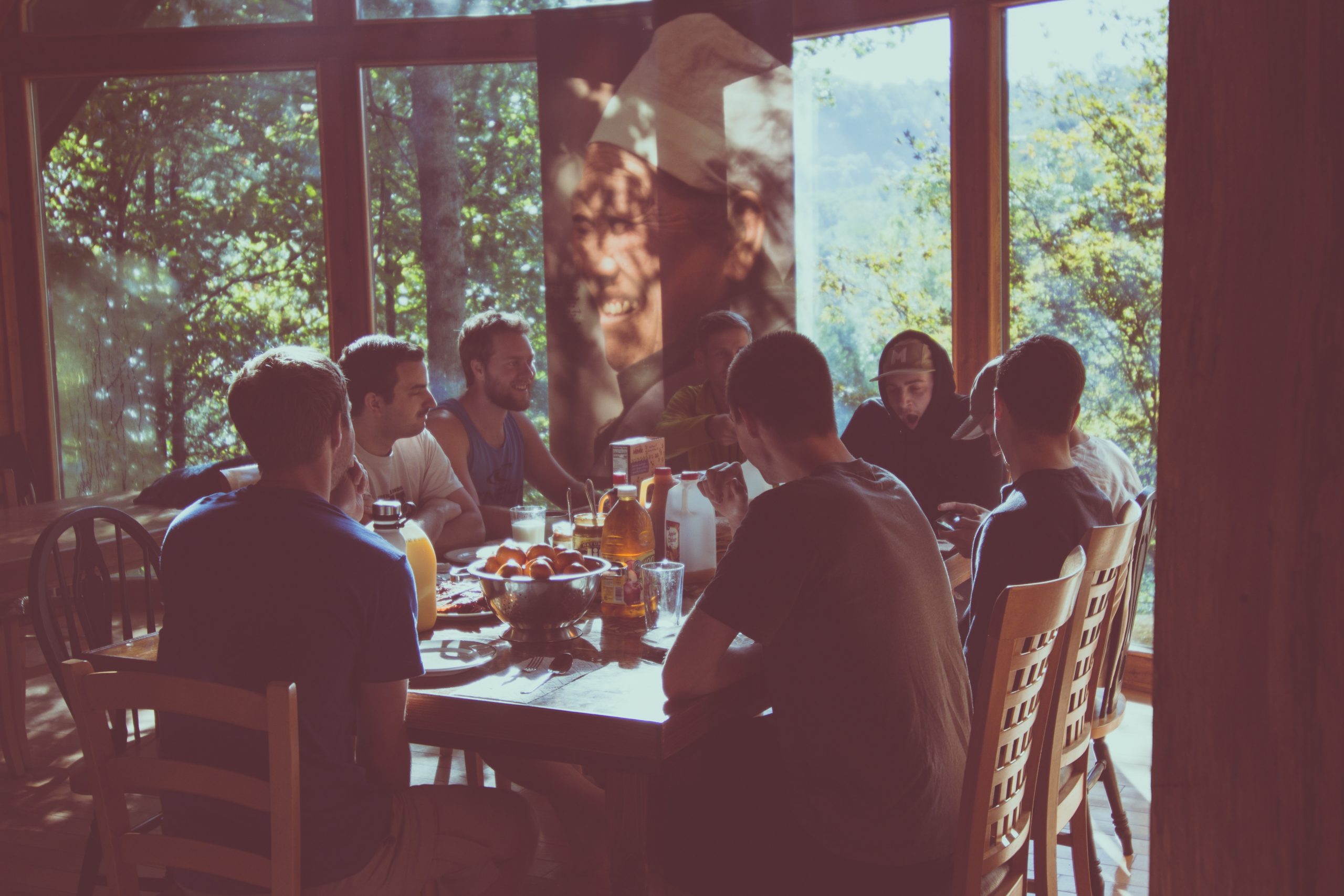 a group of people eating in a restaurant