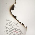 Love is patient Love is kind printed on burned paper